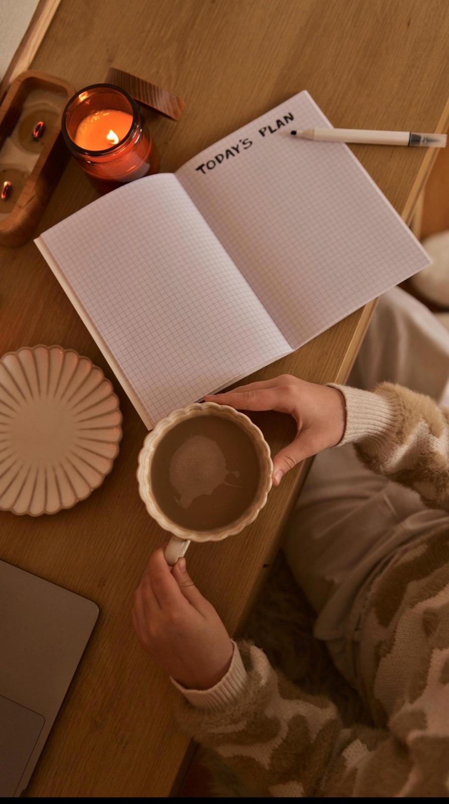 A calm morning ritual with matcha beside a daily planning notebook